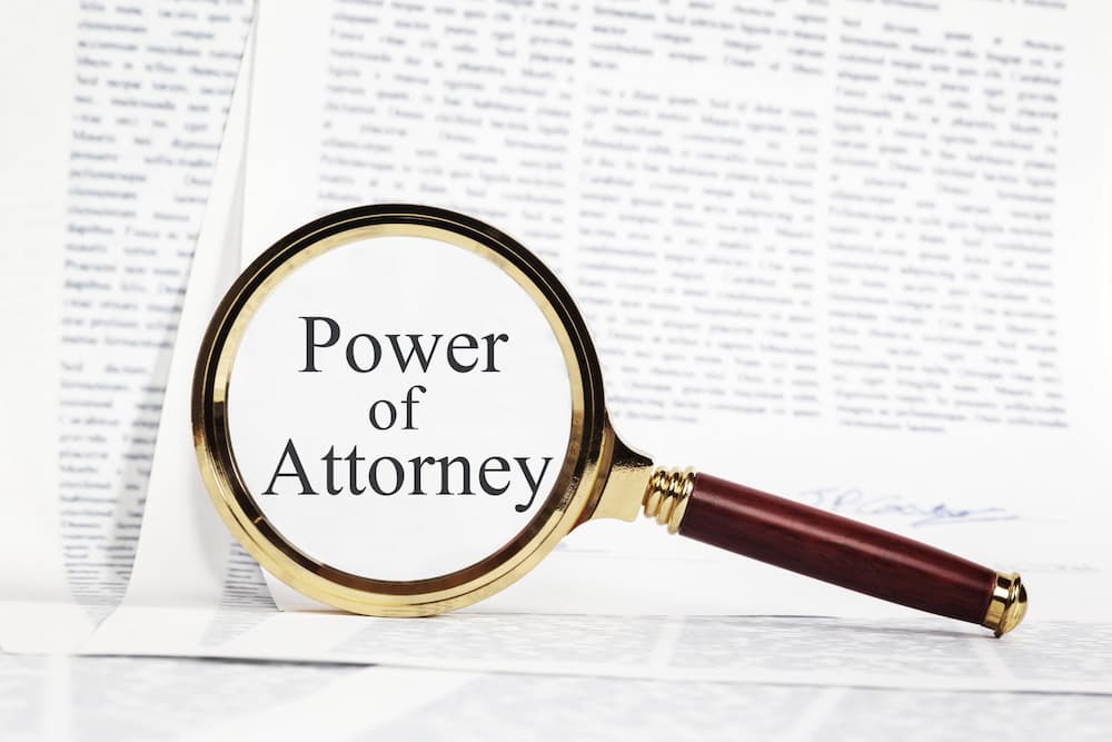 Close-up of a power of attorney document with a pen lying on top, symbolizing legal authority in estate planning and elder law decisions.