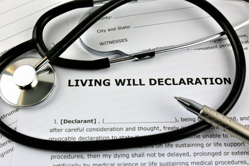 Close-up image of a living will document and a pen, highlighting the importance of advance medical directives in estate planning and elder law.
