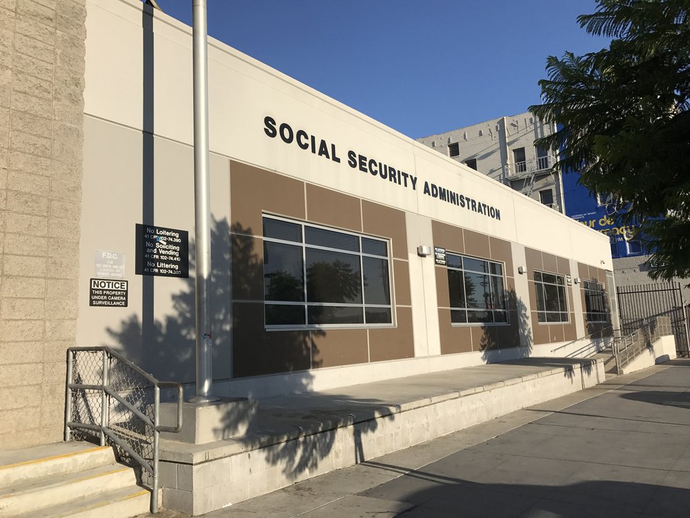 Exterior of a Social Security Administration office closed during the COVID-19 pandemic, highlighting changes in service procedures affecting estate planning and elder law.