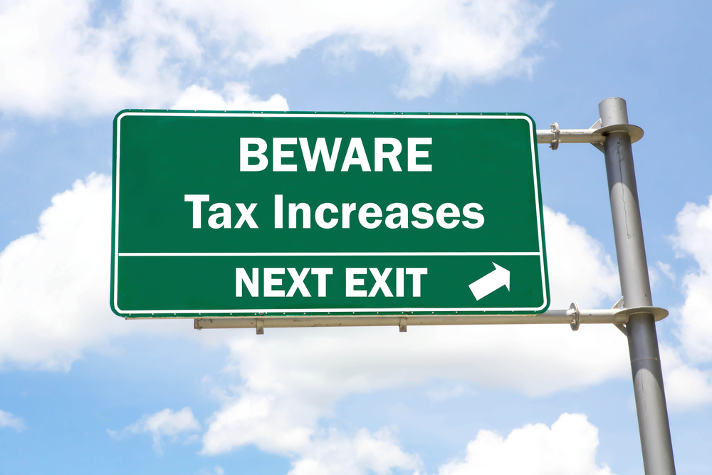 Conceptual image illustrating increased taxes and changes to estate planning, highlighting proposed legislative shifts in estate taxation and inheritance rules.