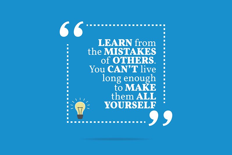 Elderly man thoughtfully reading documents with family, illustrating challenges in estate planning.