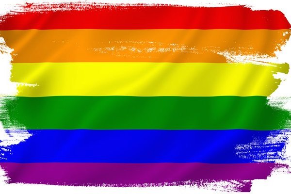 A vibrant LGBT pride flag symbolizing the legal recognition of same-sex marriages, advocating for equal estate planning and elder law rights for LGBT couples.