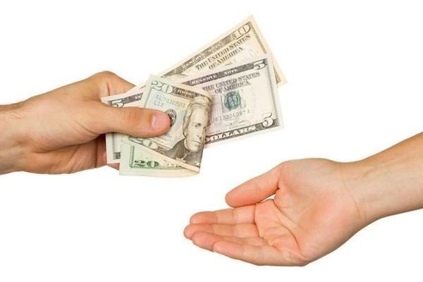 A collection of US currency, symbolizing financial considerations and planning for Medicare Part B enrollment and its associated penalties.