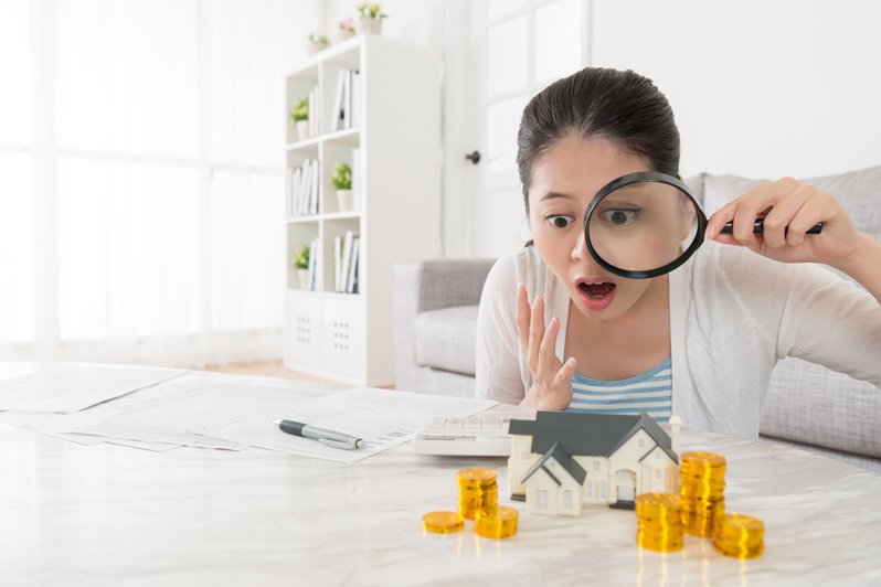 A surprised elderly man holding his head in disbelief, symbolizing the unexpected challenges posed by family conflicts in estate planning.