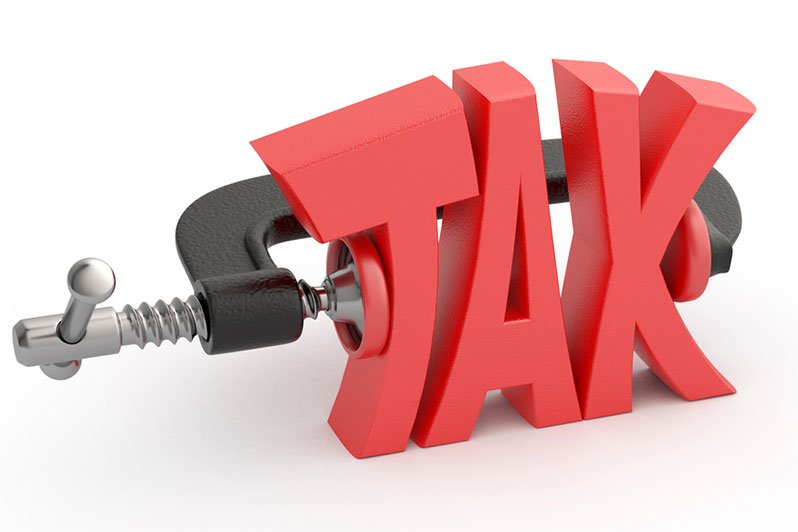 Image depicting a financial squeeze indicating the impact of high income taxes on irrevocable trusts in estate planning and elder law.