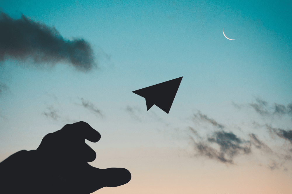 Arrow pointing upward in the sky representing letting go of control in long-term planning