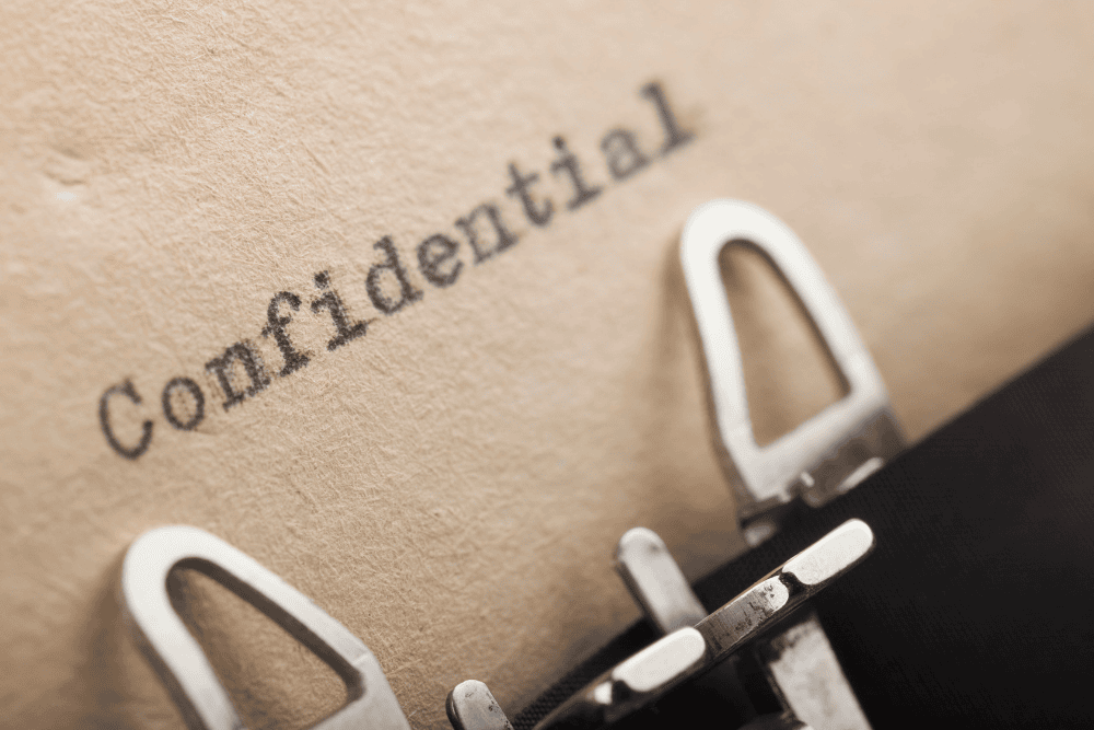 Document stamped “confidential,” illustrating estate planning privacy and what becomes public in probate versus what stays private with trusts.