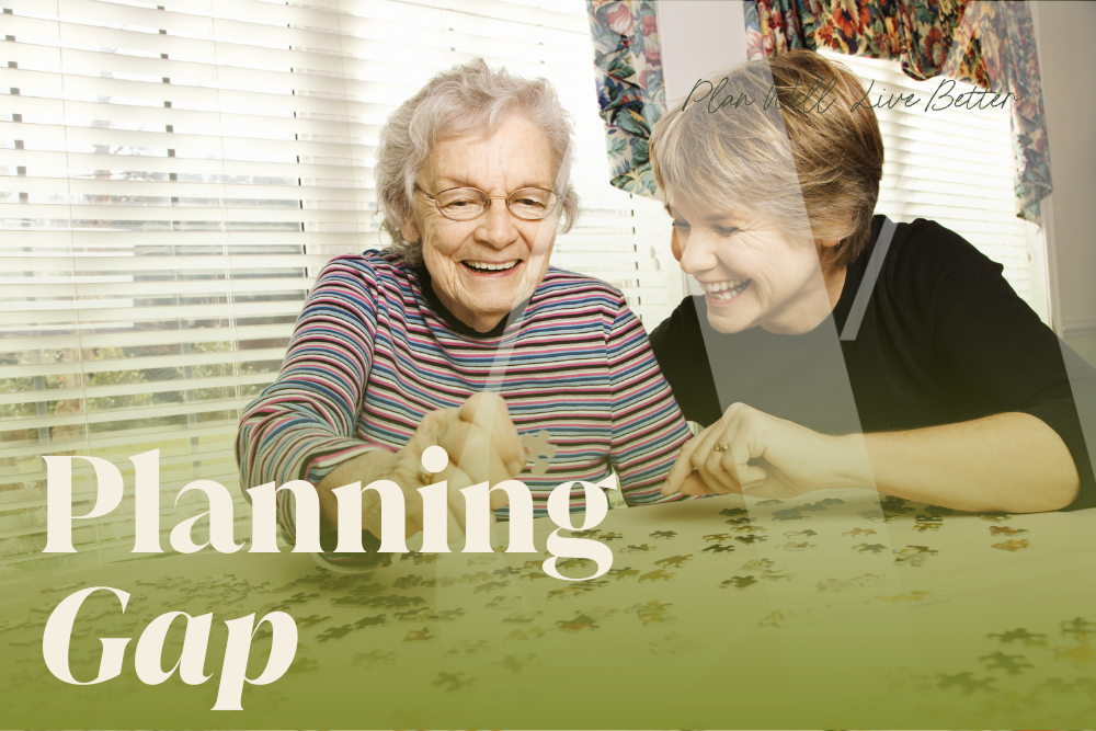 Older couple reviewing finances together representing the planning gap between retirement plans and long-term care costs.