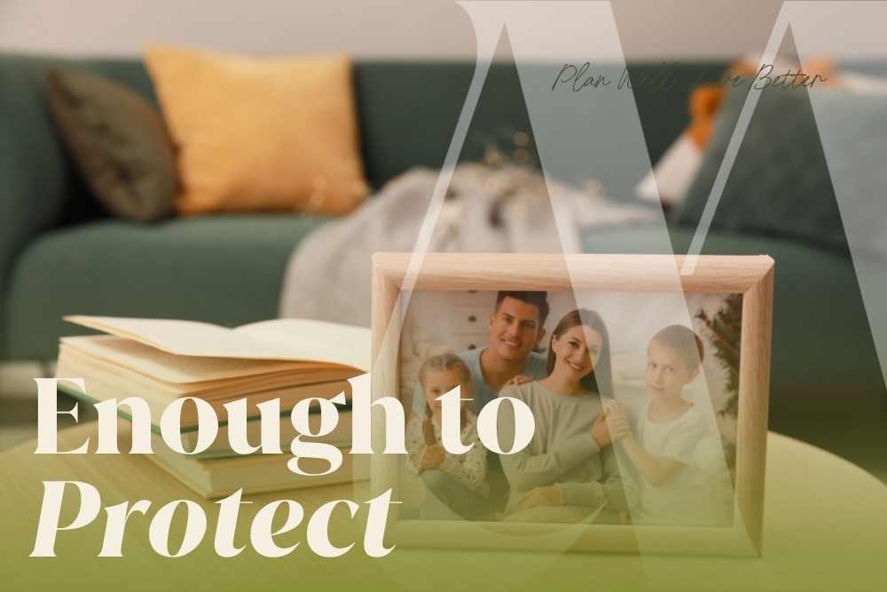 Family photo in a wooden frame on a coffee table with books and the words "Enough to Protect" — why every family needs a will regardless of how much they have